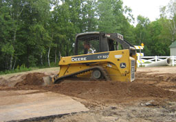 Kadlec Excavating Bobcat moves dirt.