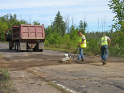 Kadlec Excavating crew packs the site and performs final clean-up.